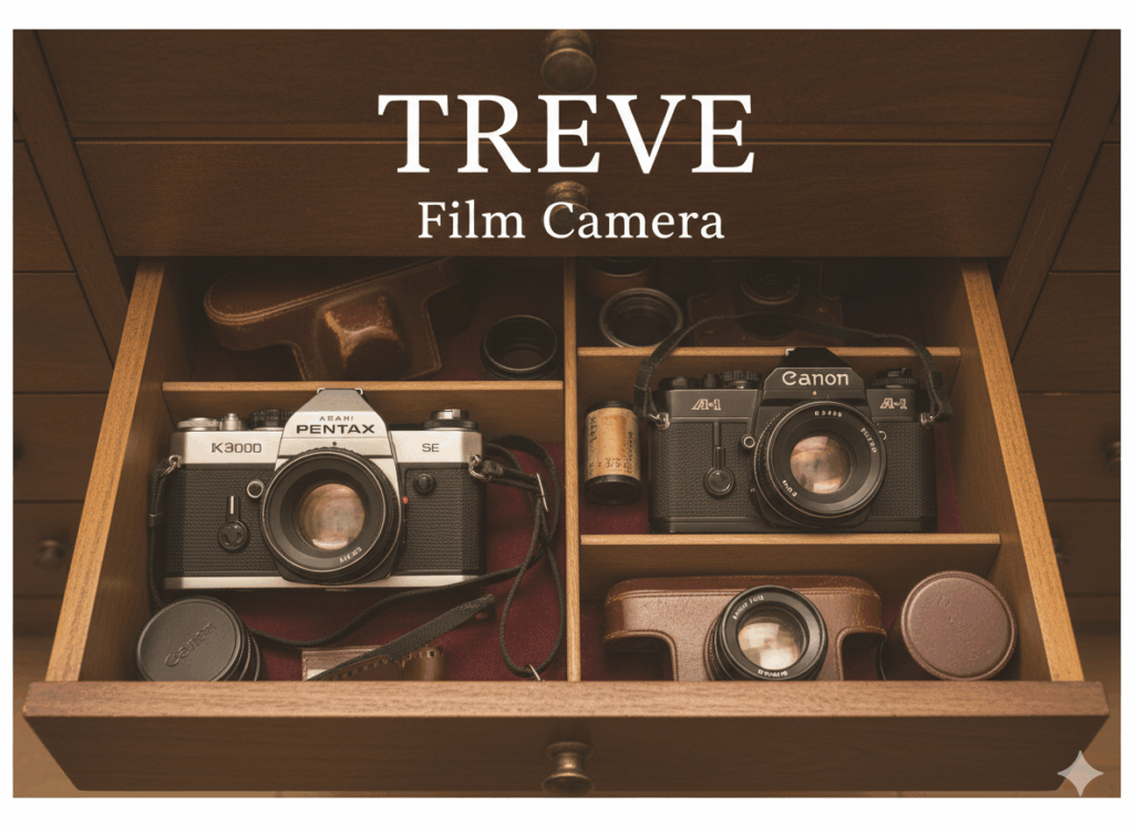 木製の引き出しの中に、PENTAX（ペンタックス）K3000とCanon（キヤノン）A-1など、複数のフィルムカメラとレンズが収納された画像。高松市内のフィルムカメラ買取専門店「TREVE」のイメージ。