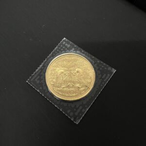 高松市で店頭買取した天皇陛下御在位60年記念10万円金貨（純金製）。