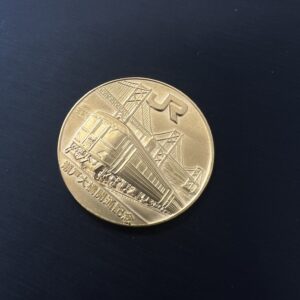 高松市でお買取りした純金（K24）製「瀬戸大橋開通記念10万円金貨」。