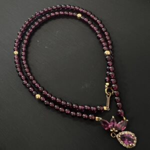 高松市のトレリバで買取したK18ガーネットダイヤモンドネックレス。連ネックレスとフラワーモチーフ。宝石・ジュエリー査定。