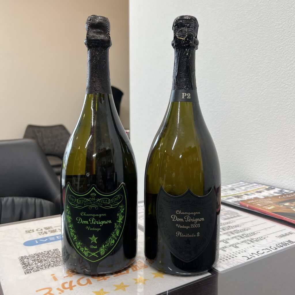 高松市のトレリバで買取したドン・ペリニヨン（ルミナスラベルとP2）のボトル2点の画像。