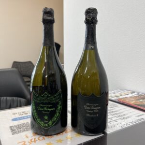 高松市のトレリバで買取したドン・ペリニヨン（ルミナスラベルとP2）のボトル2点の画像。