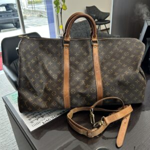 高松市のトレリバで買取したルイヴィトン（LOUIS VUITTON）モノグラムの大型ボストンバッグとショルダーストラップの画像。