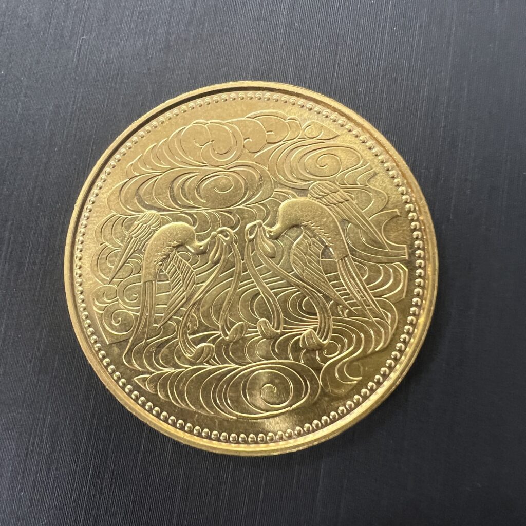高松市のトレリバで買取した天皇陛下御在位60年記念10万円金貨。純金20gの輝き。管理番号2808。