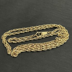 高松市のトレリバで買取したK18イエローゴールドネックレス。美しい編み込みデザインの18金チェーンジュエリーの画像。