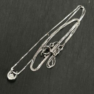 高松市のトレリバで買取したK10ホワイトゴールドネックレス。ホースシューモチーフの一粒ダイヤモンドジュエリーの画像。